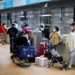 Coreanos regresan a su país luego de emigrar